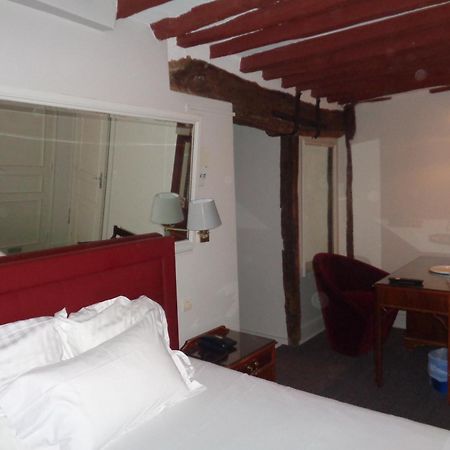 Hotel Les Degres De Notre Dame Paris Bagian luar foto