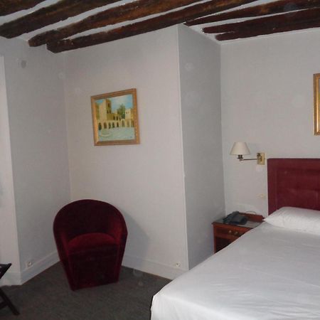 Hotel Les Degres De Notre Dame Paris Bagian luar foto
