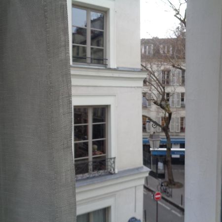 Hotel Les Degres De Notre Dame Paris Bagian luar foto