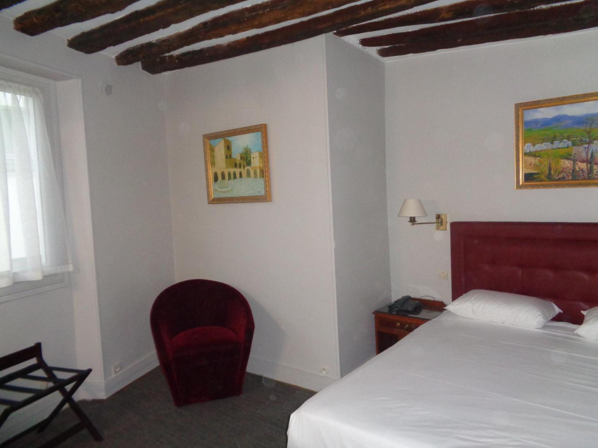 Hotel Les Degres De Notre Dame Paris Bagian luar foto