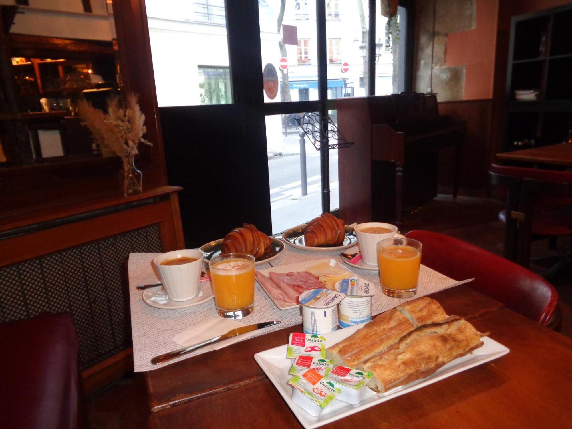 Hotel Les Degres De Notre Dame Paris Bagian luar foto