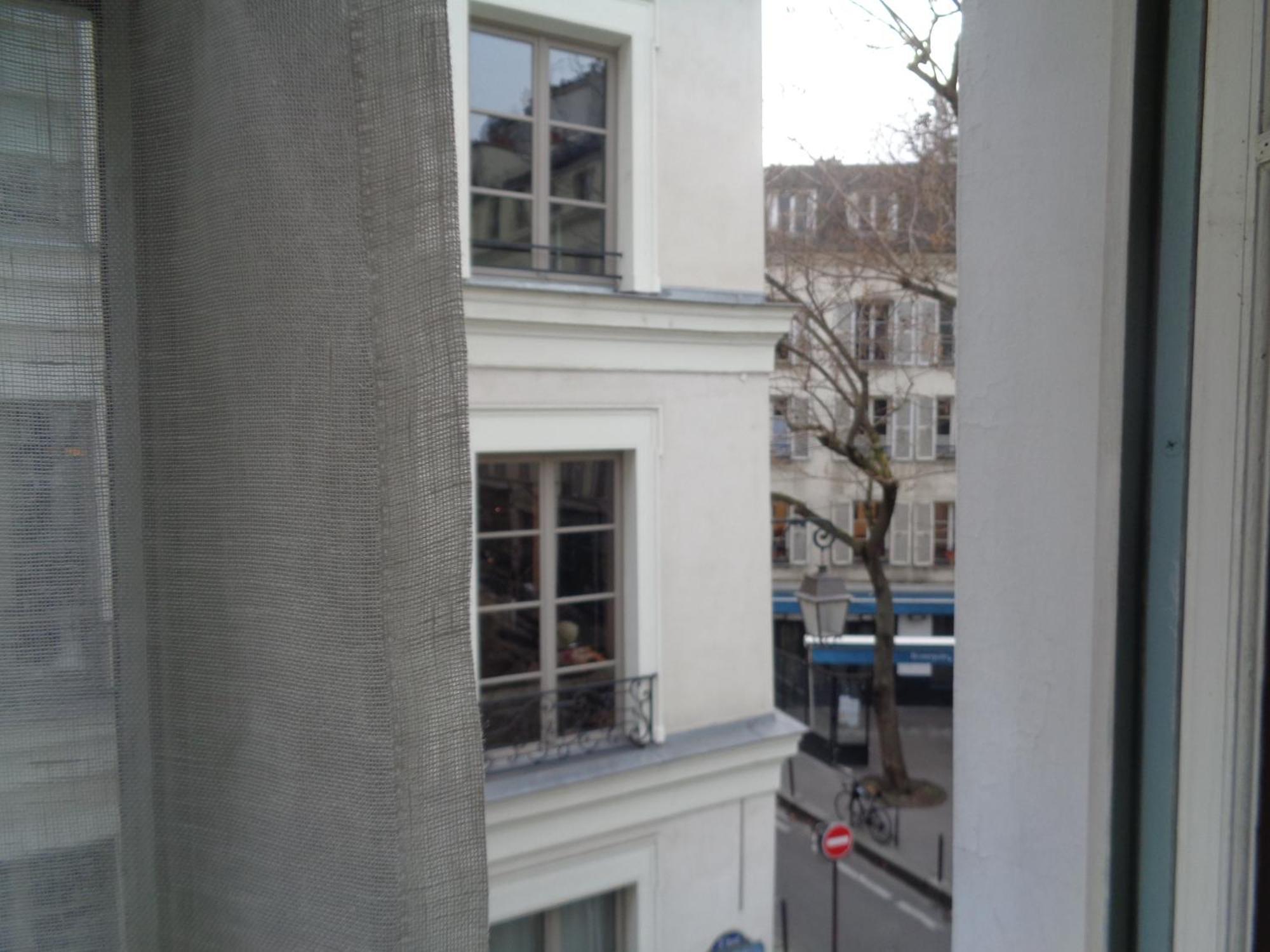 Hotel Les Degres De Notre Dame Paris Bagian luar foto