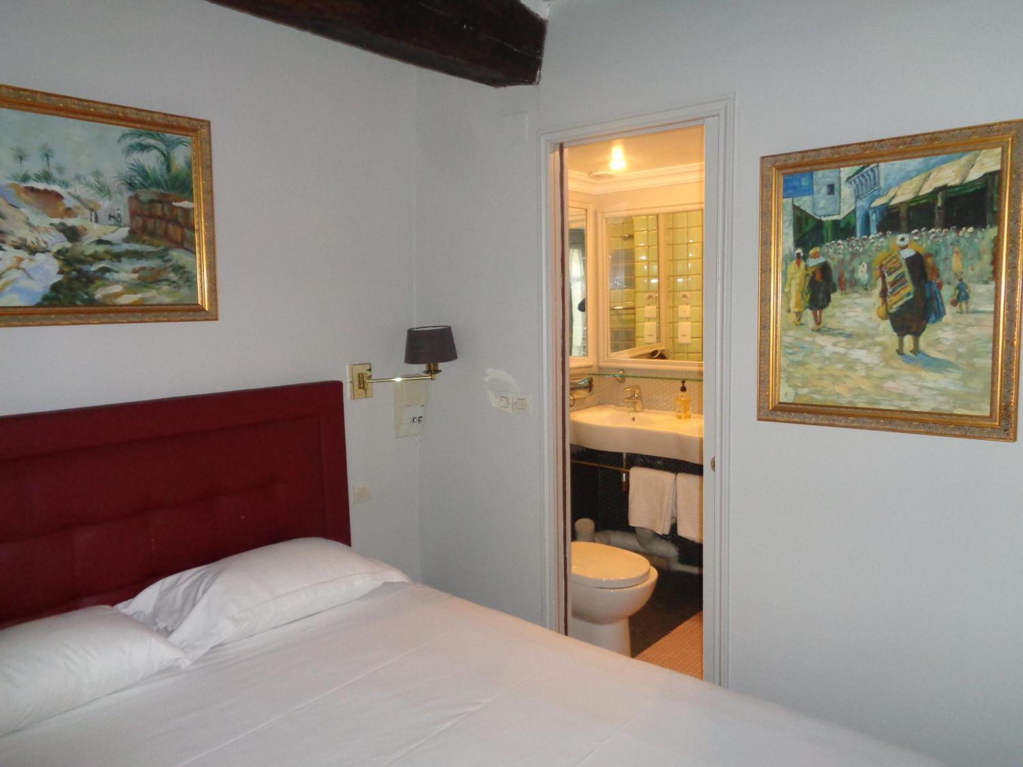 Hotel Les Degres De Notre Dame Paris Bagian luar foto