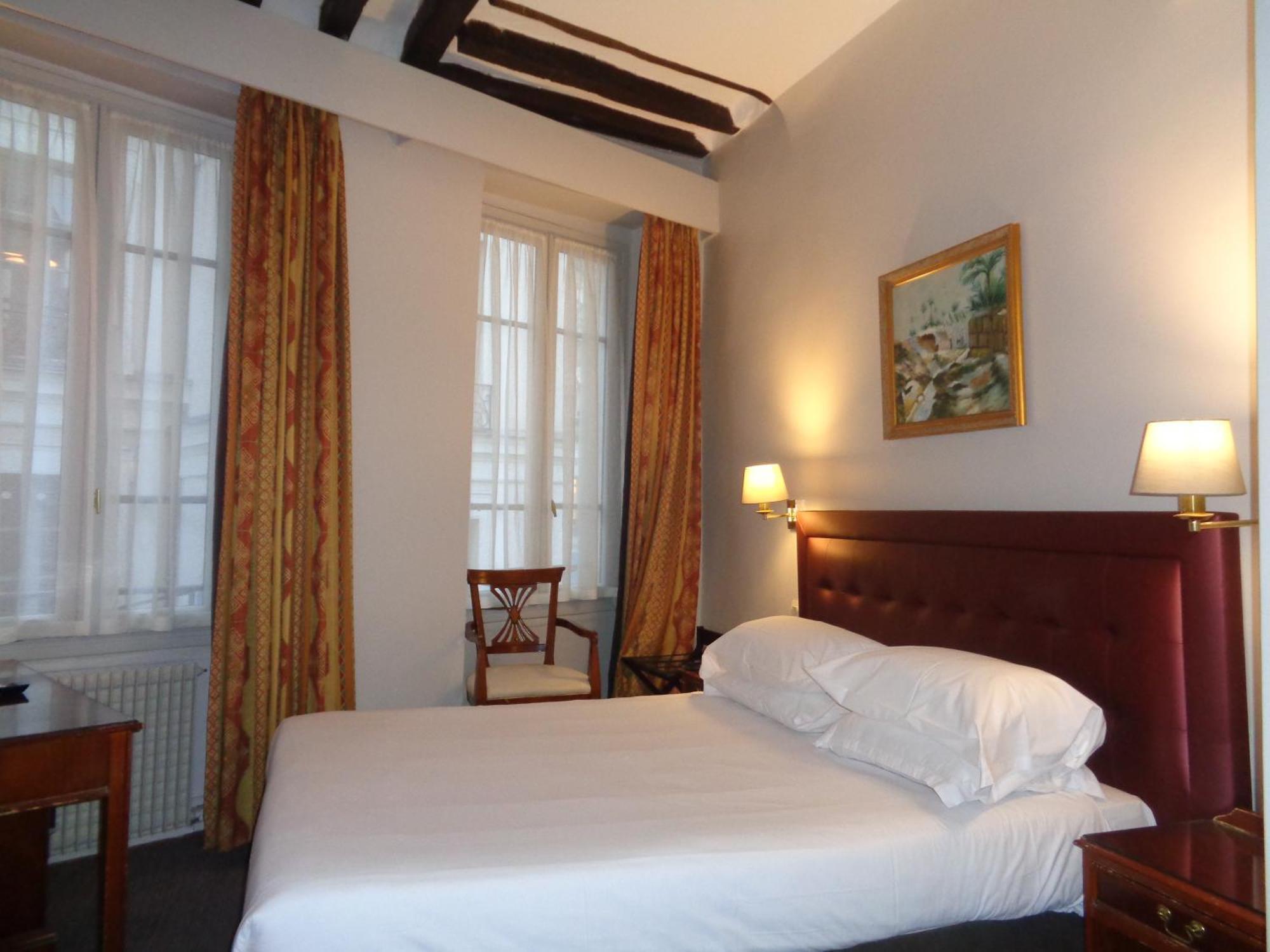 Hotel Les Degres De Notre Dame Paris Bagian luar foto