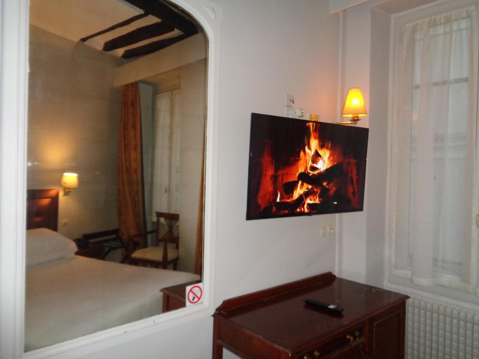 Hotel Les Degres De Notre Dame Paris Bagian luar foto